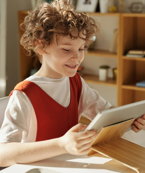 girl writing on tablet